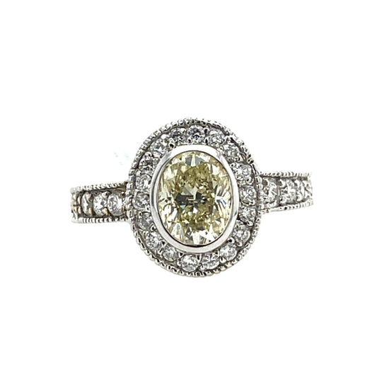 1.257 ct Oval Yellow Diamond Halo Ring